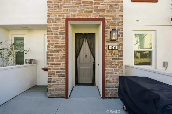 a kitchen with a counter space a sink appliances and cabinets