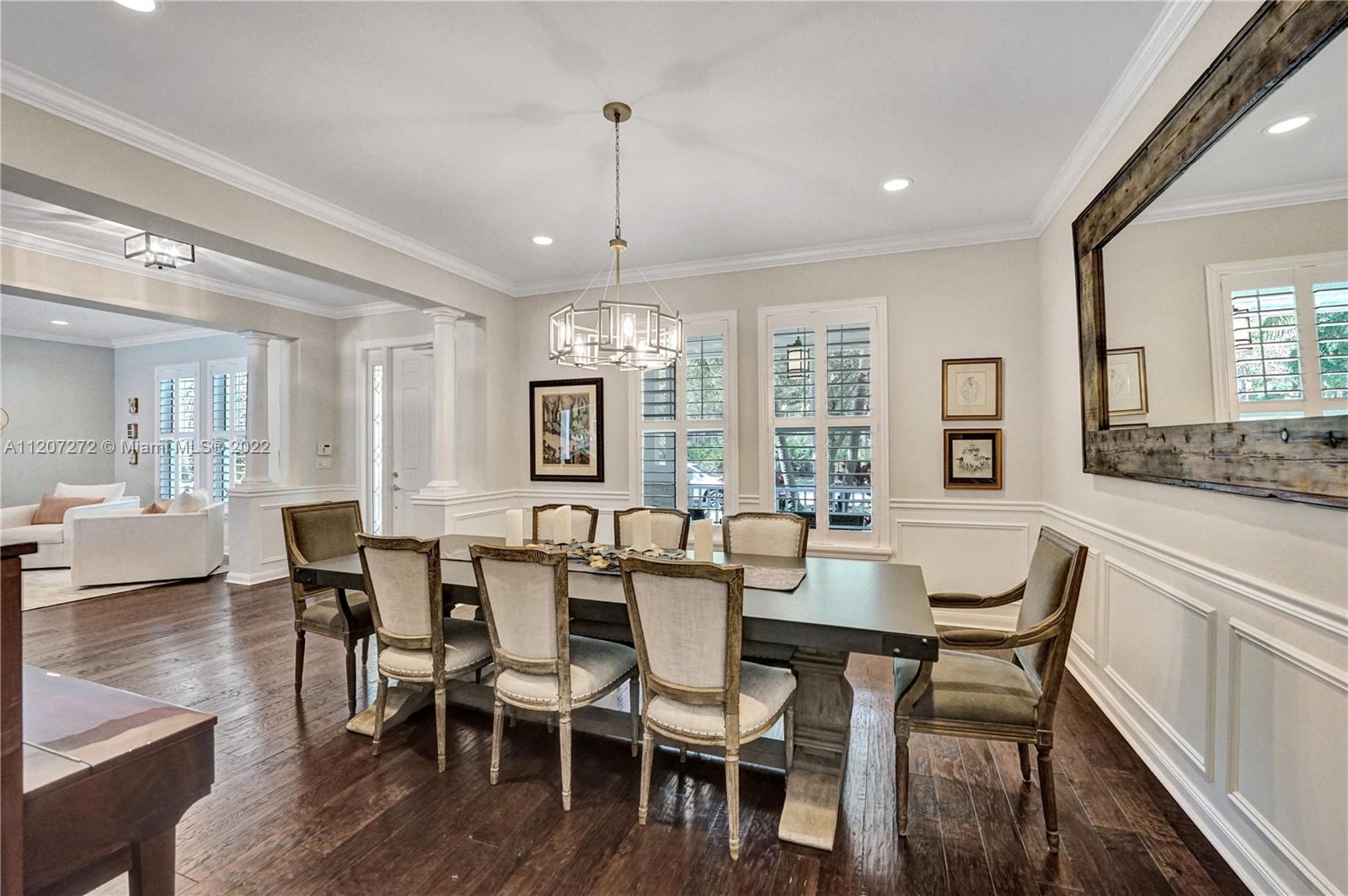 1055 Frederick Small Road Jupiter, FL 33458 - Photo 12 of 48 a view of a dining room with furniture window and wooden floor