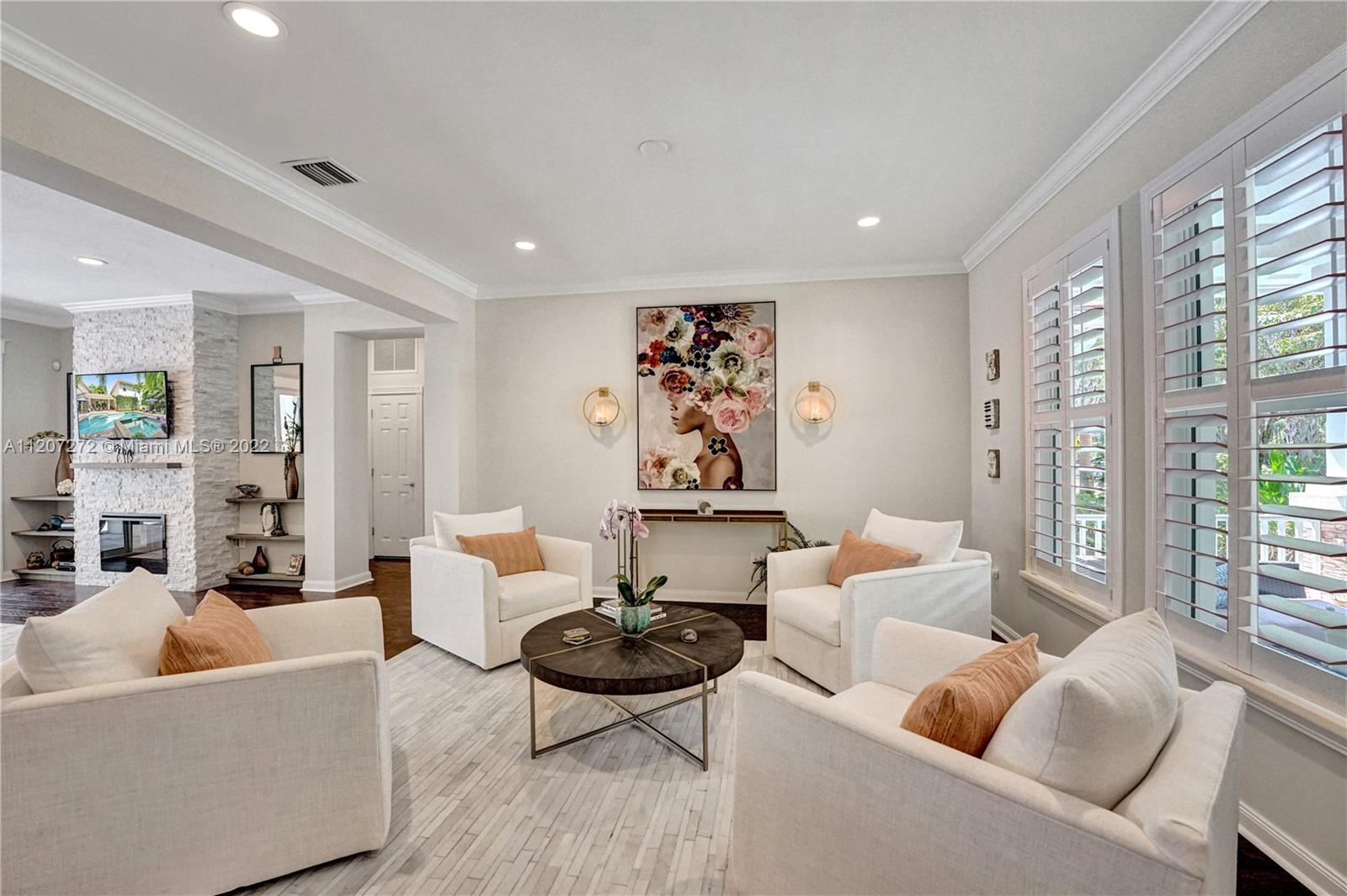 1055 Frederick Small Road Jupiter, FL 33458 - Photo 15 of 48 a living room with furniture and a large window