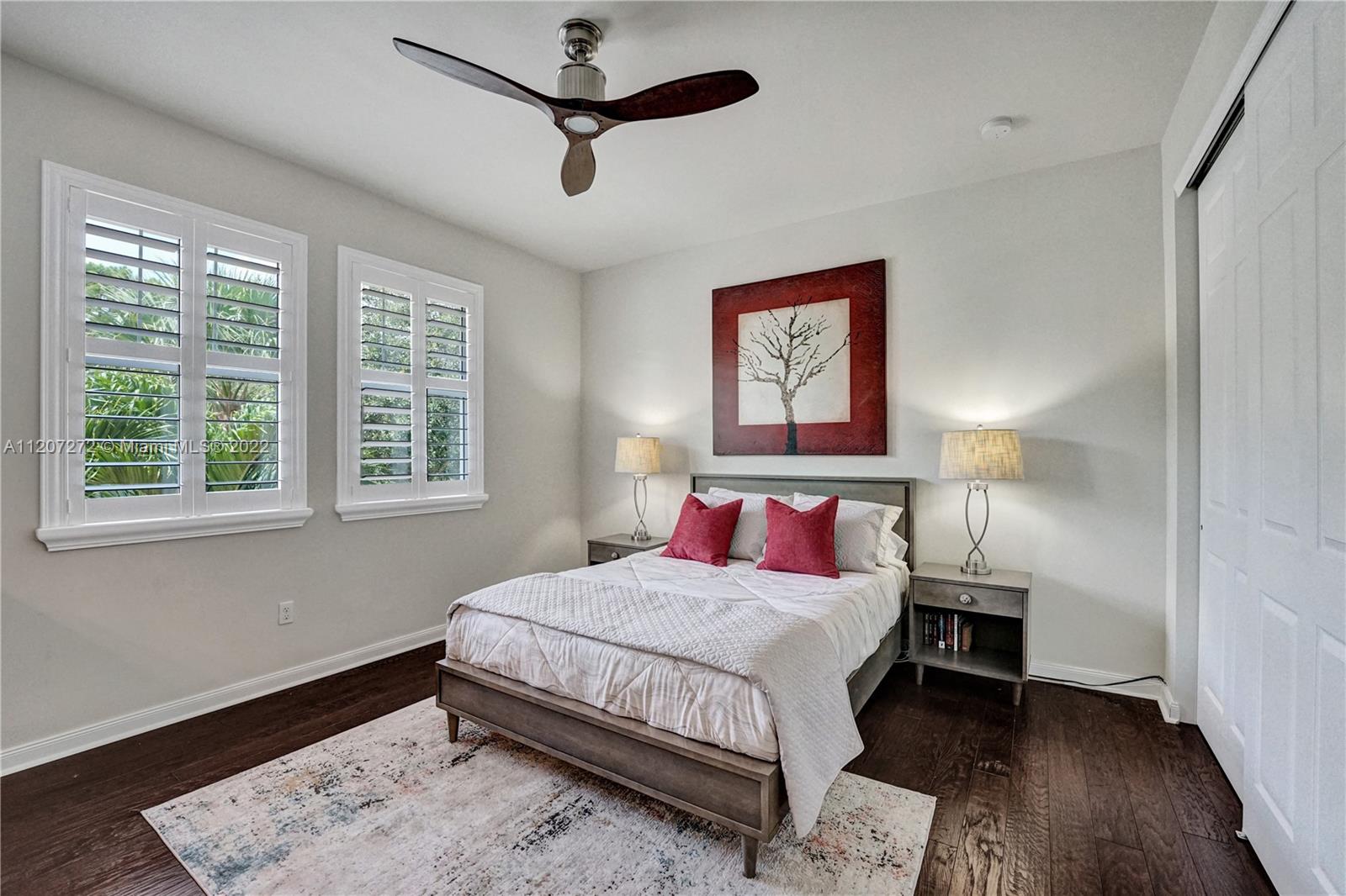 1055 Frederick Small Road Jupiter, FL 33458 - Photo 30 of 48 a bedroom with a bed and a window