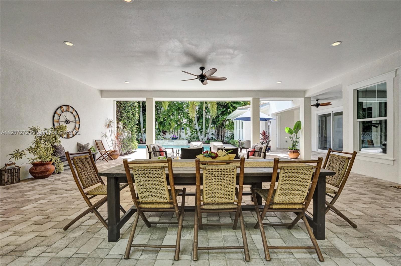 1055 Frederick Small Road Jupiter, FL 33458 - Photo 45 of 48 a view of a dining room with furniture window and outside view