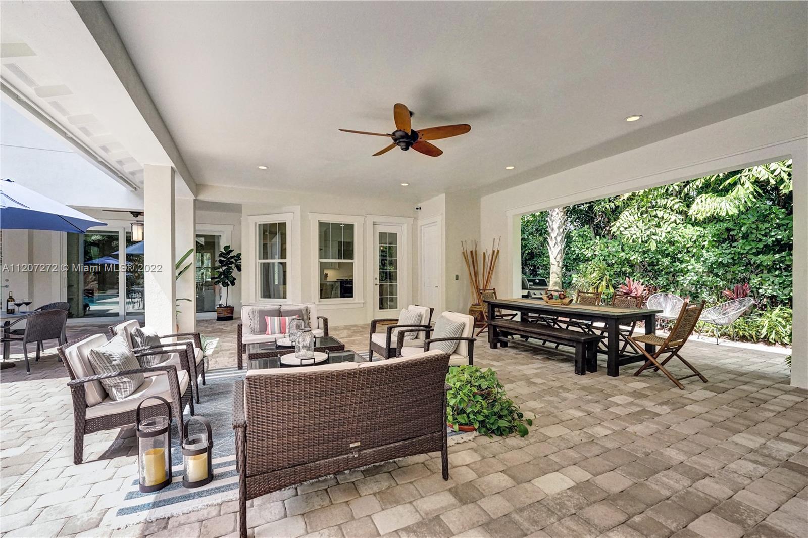 1055 Frederick Small Road Jupiter, FL 33458 - Photo 46 of 48 a living room with furniture and large windows