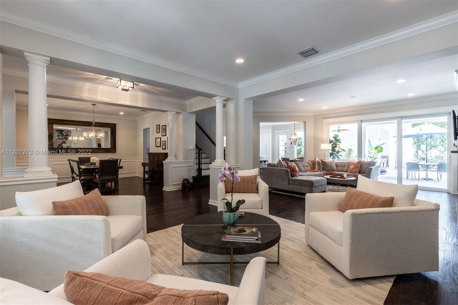 1055 Frederick Small Road Jupiter, FL 33458 - Photo 5 of 48 a living room with furniture and a large window