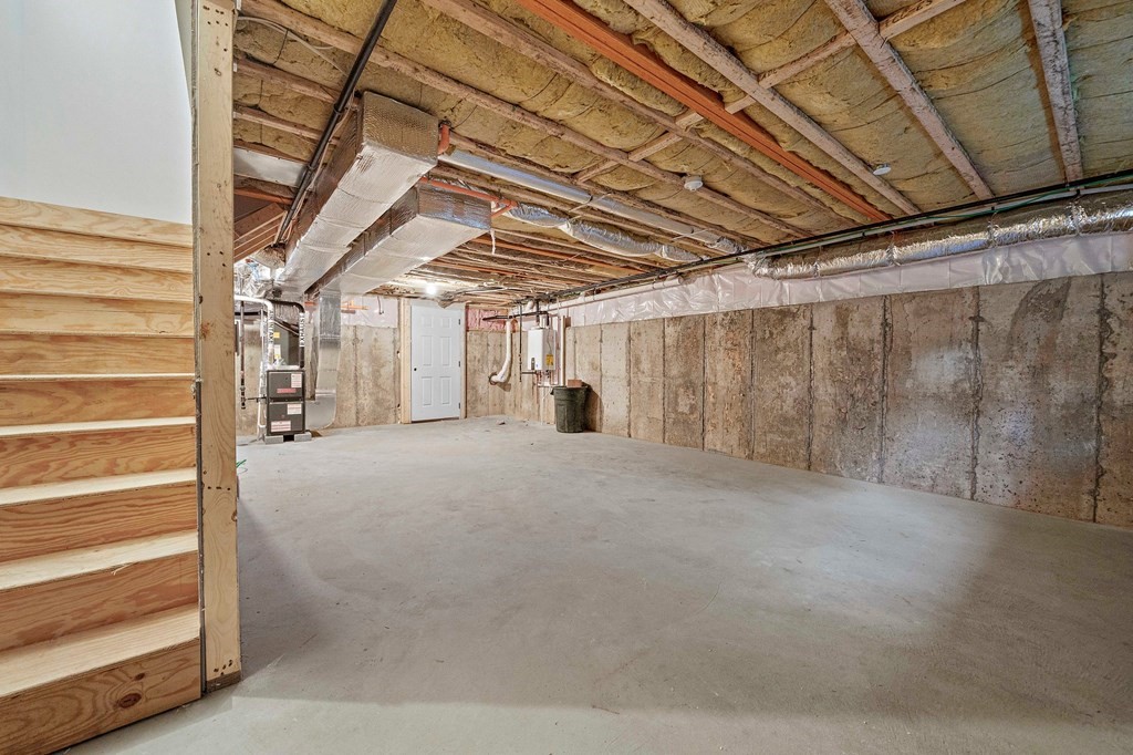 30 Old Washington Street, Unit 9 Pembroke, MA 02359 - Photo 18 of 21 a view of empty room with wooden ceiling