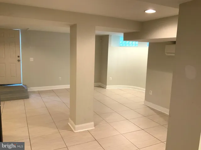 a bathroom with a toilet a sink and a shower