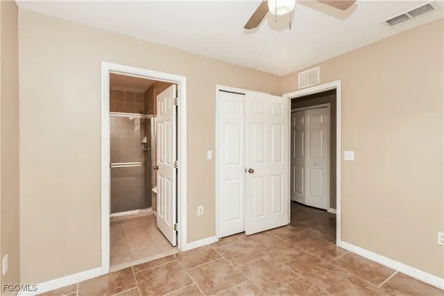 an empty room with a bathroom