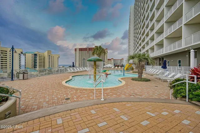 $275,000 | 9860 South Thomas Drive, Unit 119, Panama City Beach, FL 32408