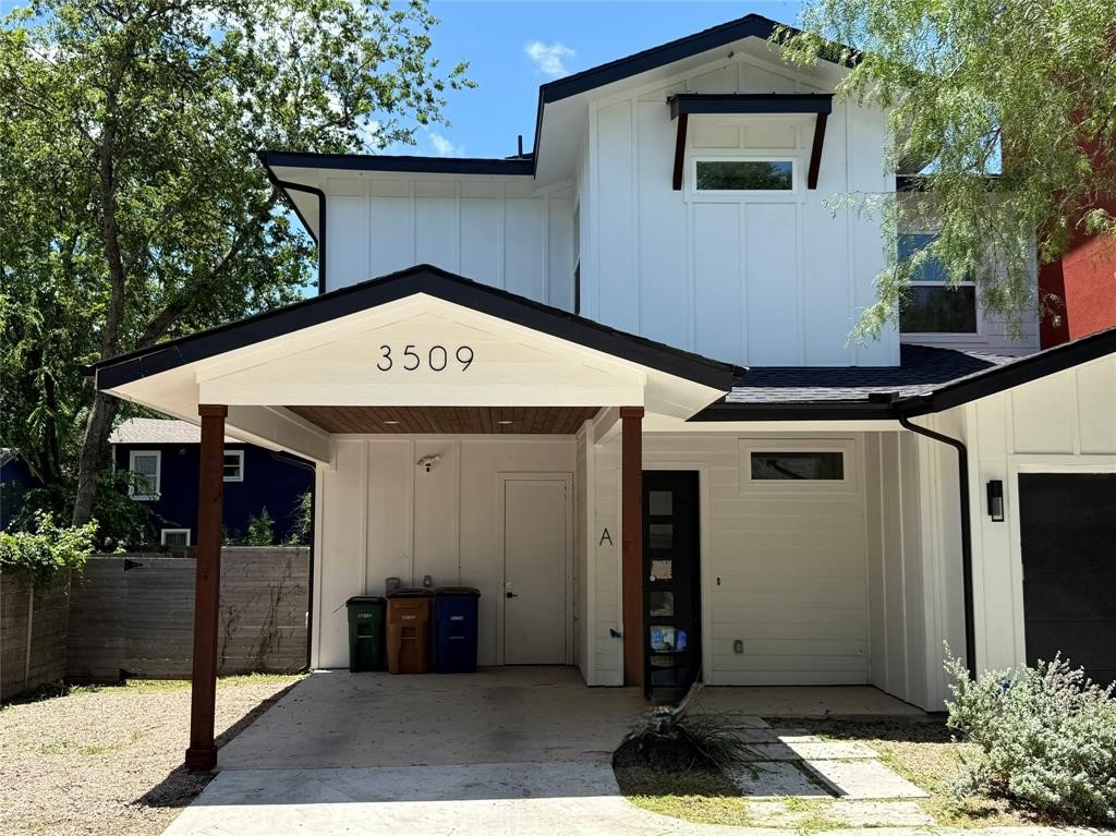 3509 Oak Springs Drive, Unit A Austin, TX 78721 - Photo 1 of 16 a front view of a house