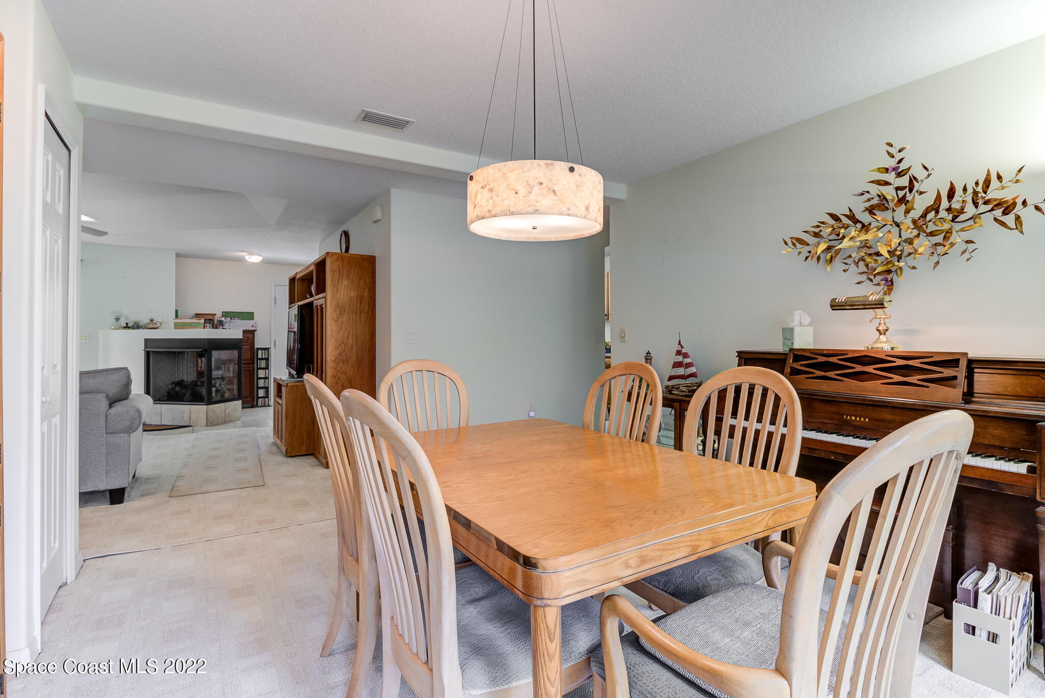 1920 Benjamin Road Malabar, FL 32950 - Photo 8 of 26 a view of a dining room with furniture