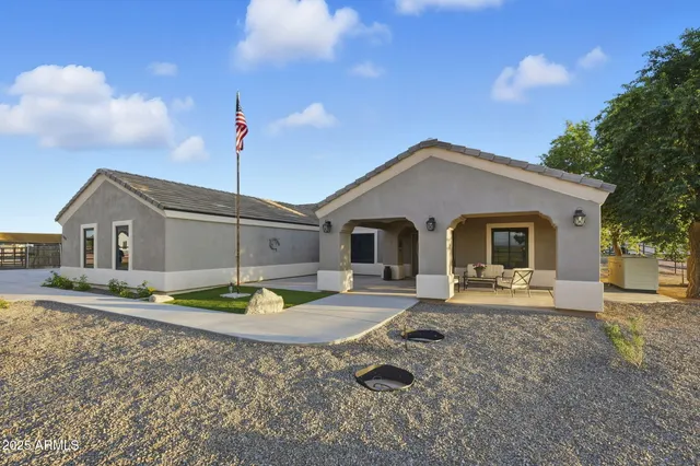 a view of backyard with green space