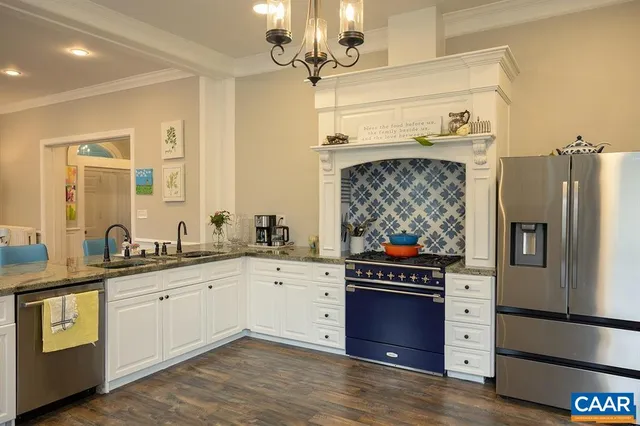 a kitchen with a stove and a sink
