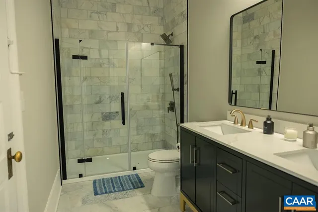 a living room with furniture a rug and a window