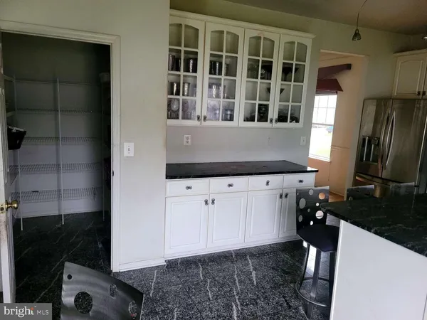 a view of a sink and a window