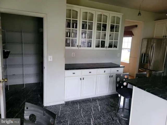 a view of a sink and a window