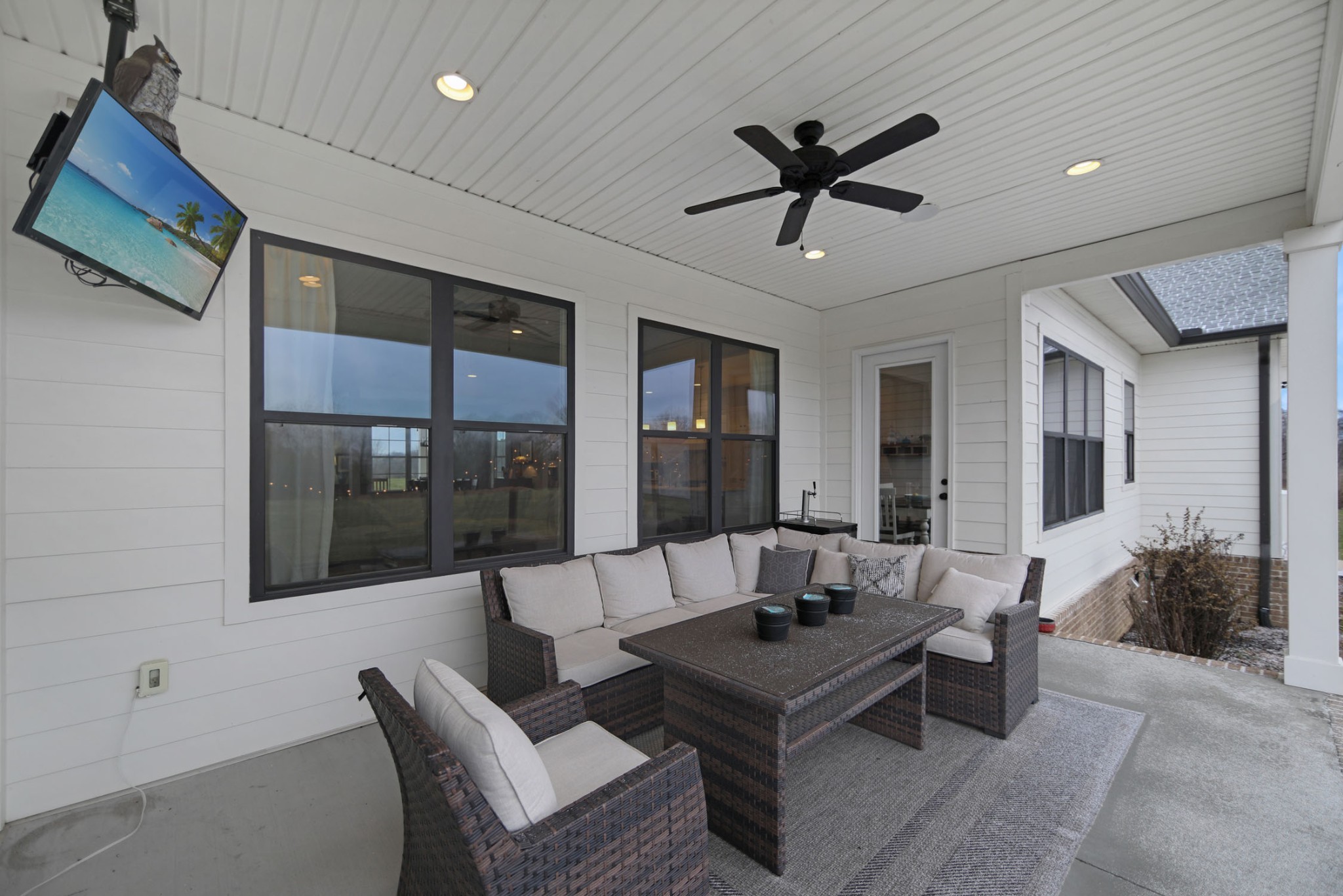 432 Bowling Branch Road Cottontown, TN 37048 - Photo 42 of 55 a living room with furniture a ceiling fan and a rug
