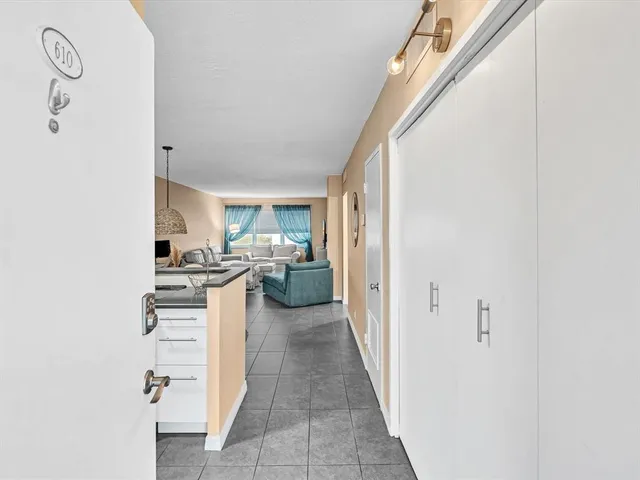 a view of a kitchen from the hallway