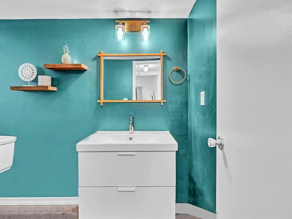 2555 Northeast 11th Street, Unit 610 Fort Lauderdale, FL 33304 - Photo 20 of 33 a bathroom with a sink and a mirror