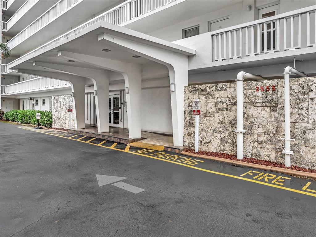 2555 Northeast 11th Street, Unit 610 Fort Lauderdale, FL 33304 - Photo 32 of 33 a view of a porch with furniture