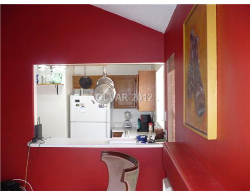 266 Westwind Road Henderson, NV 89074 - Photo 8 of 24 Living Room. Living area. Looking into kitchen