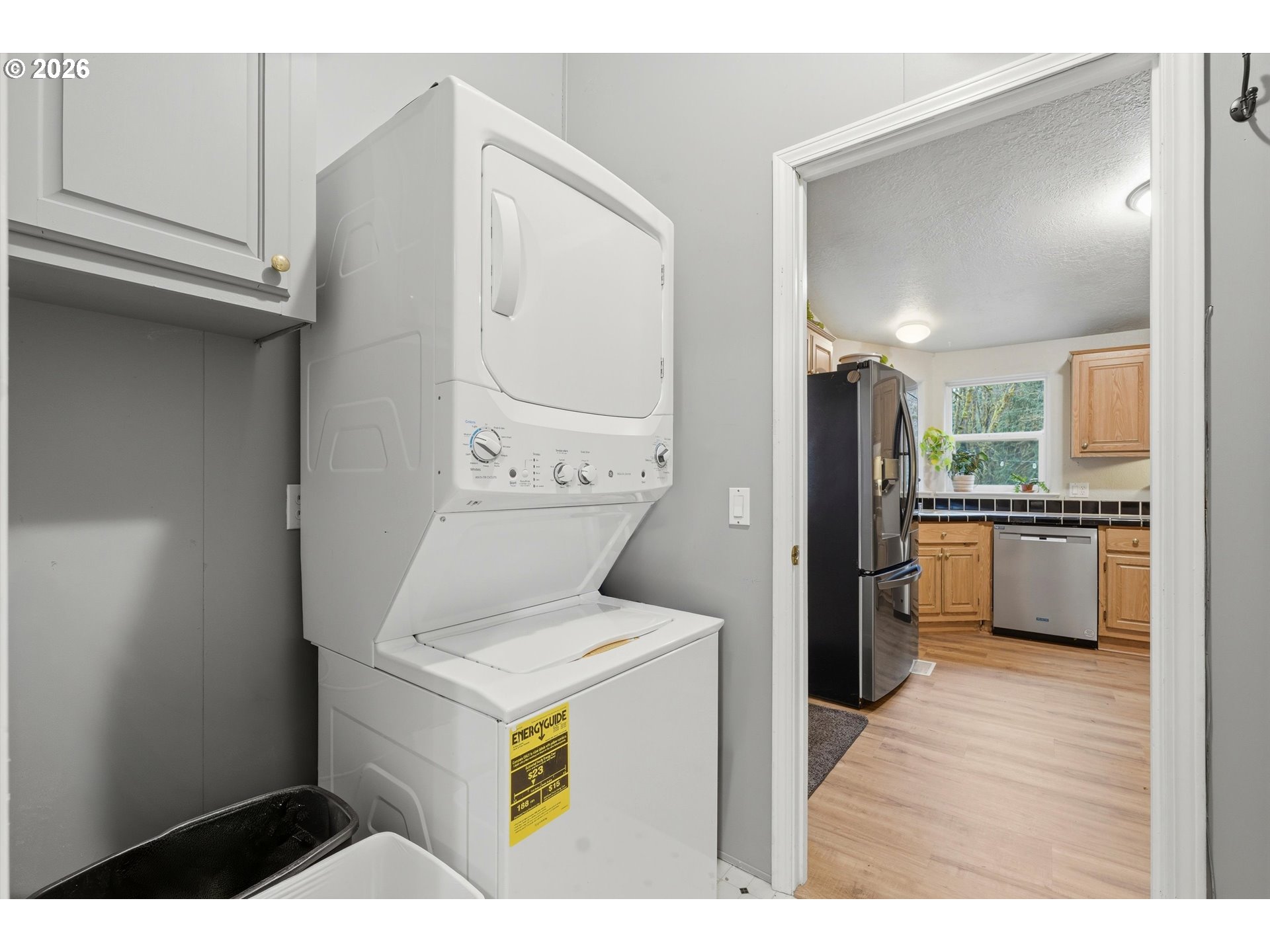 39000 Northwest Shermans Mill Road Banks, OR 97106 - Photo 19 of 38 a kitchen with a refrigerator and a sink