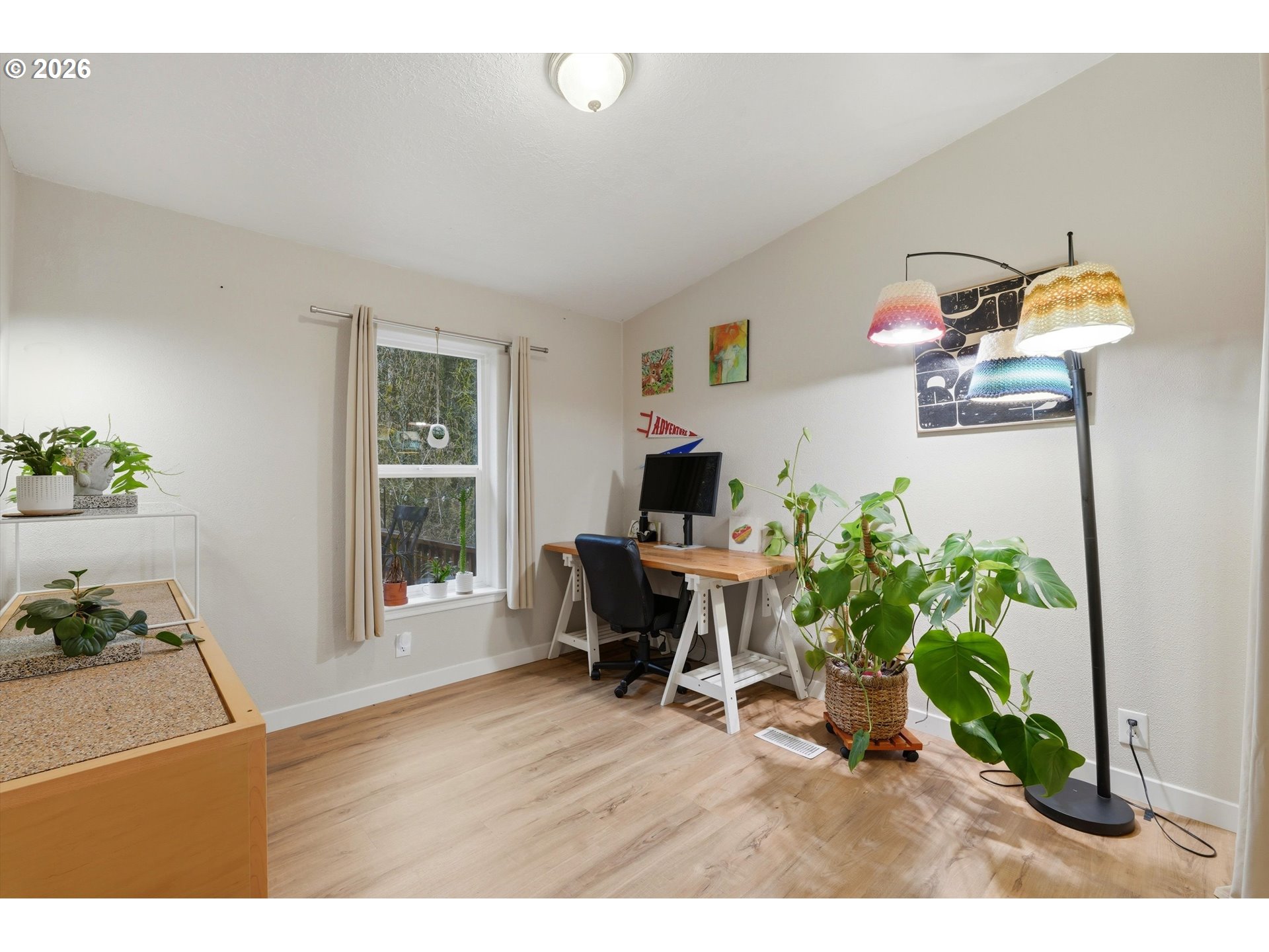 39000 Northwest Shermans Mill Road Banks, OR 97106 - Photo 20 of 38 a living room with furniture and a potted plant