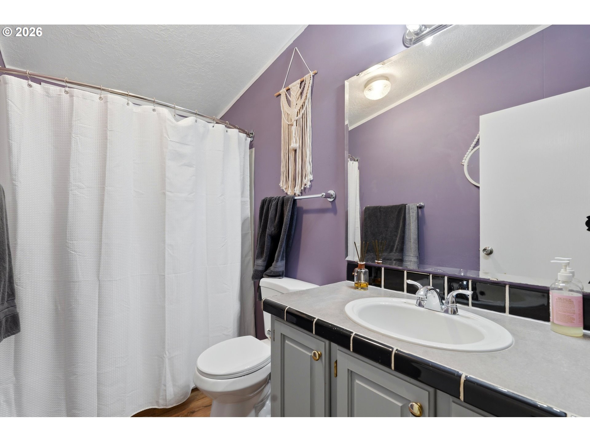 39000 Northwest Shermans Mill Road Banks, OR 97106 - Photo 26 of 38 a bathroom with a sink toilet and mirror
