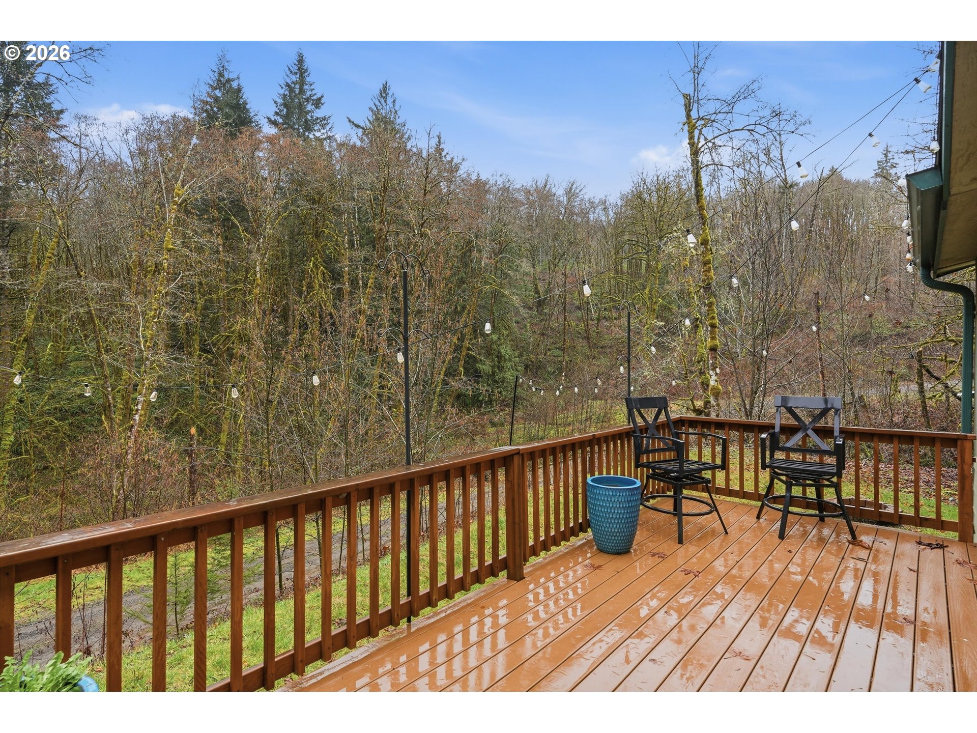 39000 Northwest Shermans Mill Road Banks, OR 97106 - Photo 27 of 38 a balcony with wooden floor and bench