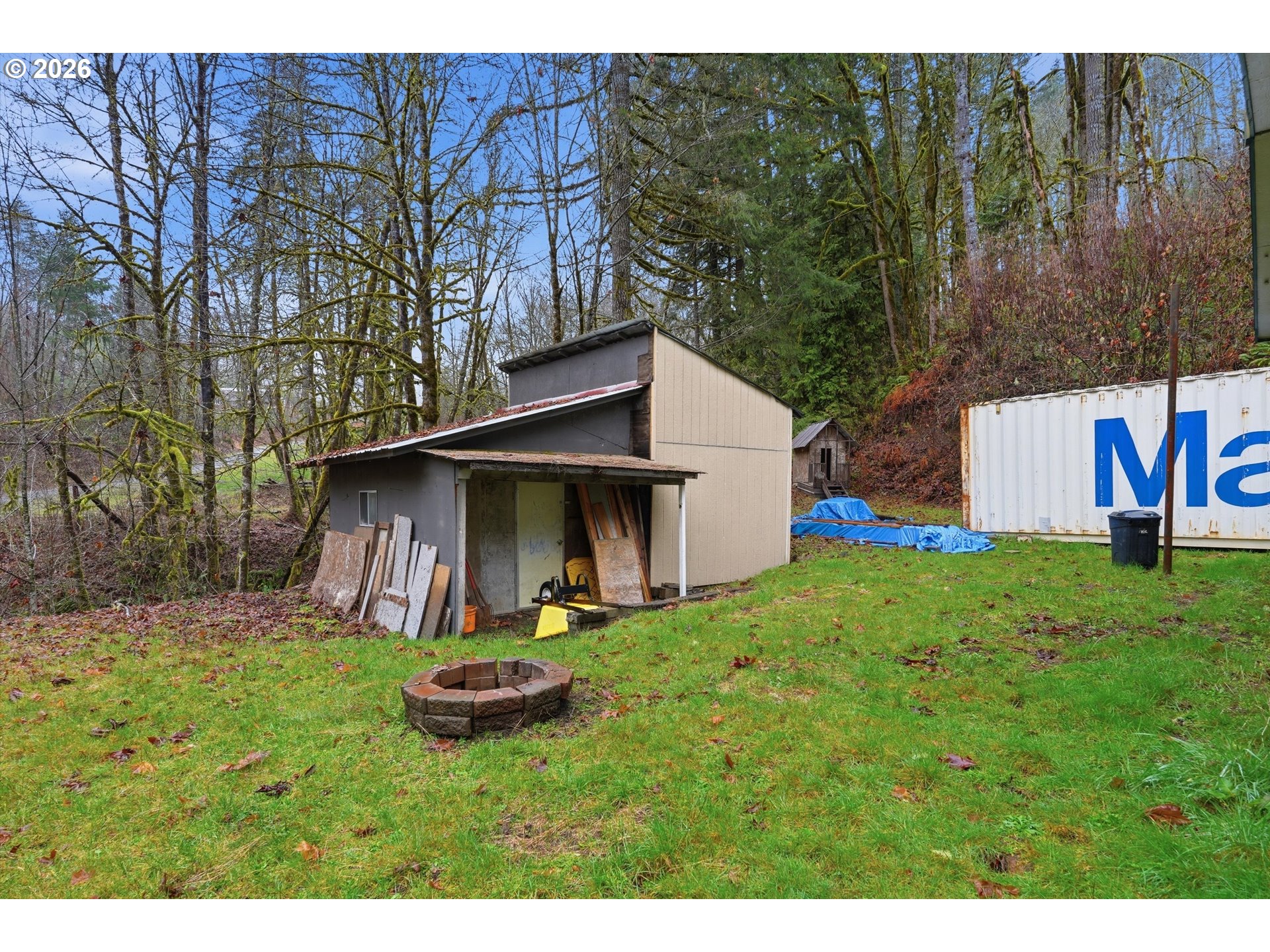 39000 Northwest Shermans Mill Road Banks, OR 97106 - Photo 30 of 38 a view of a backyard with a small cabin
