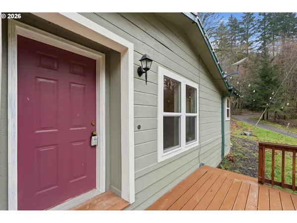 a view of backyard with hardwood floor and deck