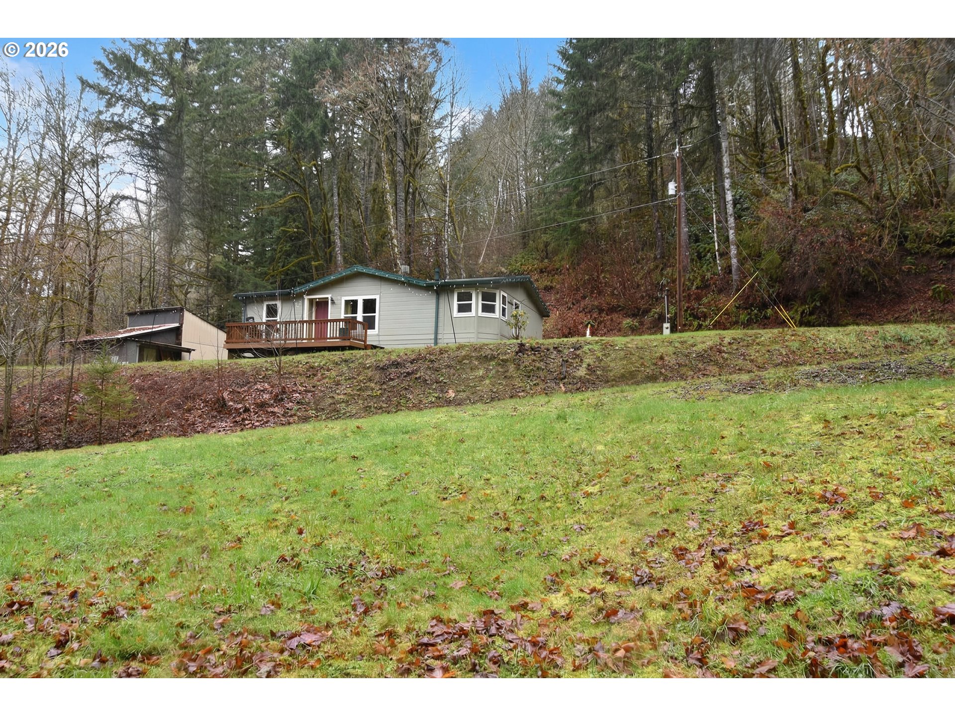 39000 Northwest Shermans Mill Road Banks, OR 97106 - Photo 34 of 38 a backyard of a house with lots of green space
