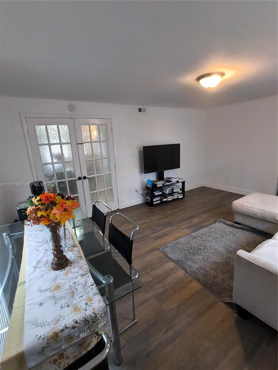 7809 Northwest 67th Avenue, Unit 7809 Tamarac, FL 33321 - Photo 12 of 13 a bedroom with furniture and a window