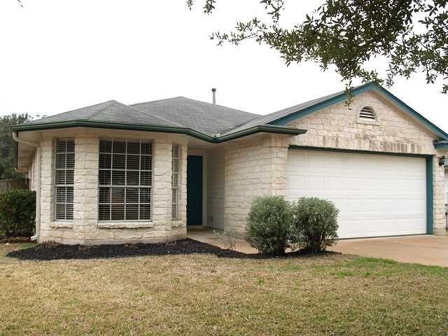 a house view with a garden space