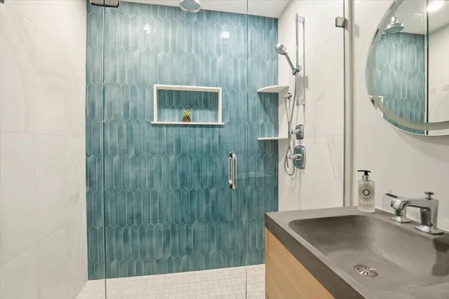 a bathroom with a sink and mirror