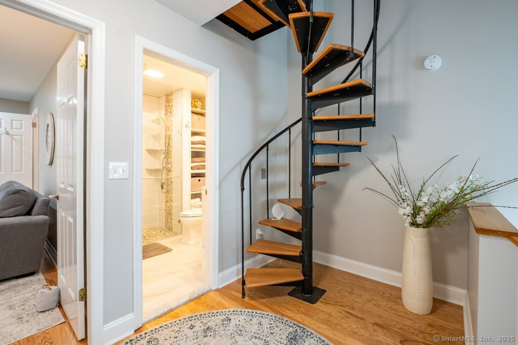 120 Sandy Point Road, Unit 120 Old Saybrook, CT 06475 - Photo 9 of 39 Stairs to 3rd floor loft