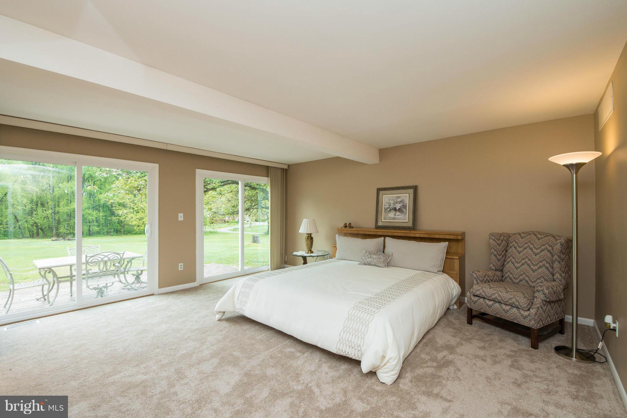 856 Maple Road Gambrills, MD 21054 - Photo 16 of 30 Large Master Bedroom w/ Slider To Deck