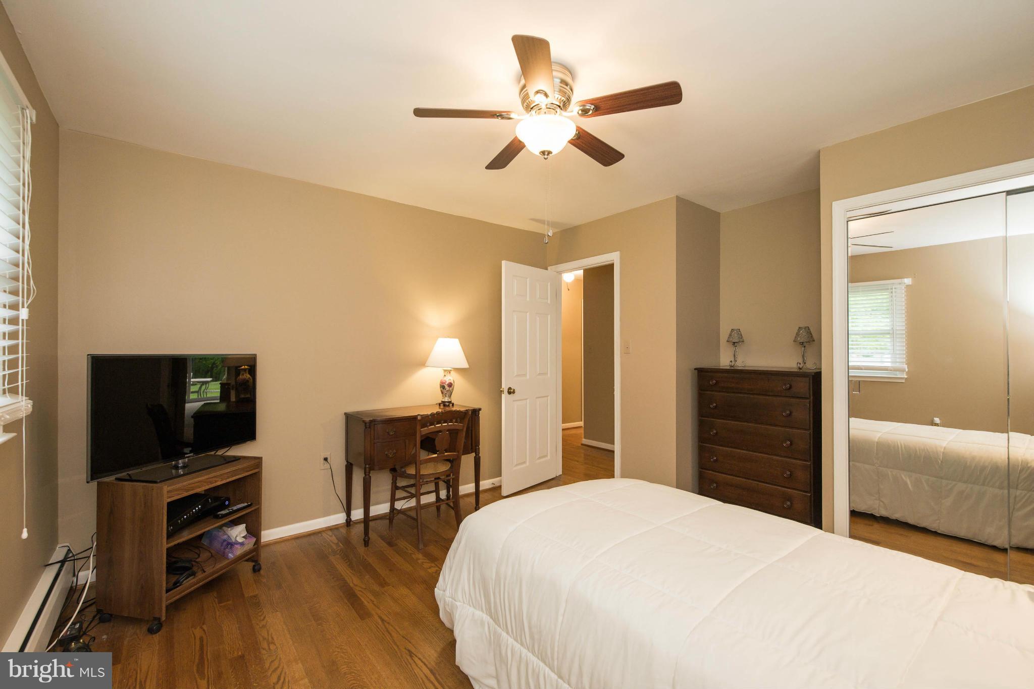 856 Maple Road Gambrills, MD 21054 - Photo 21 of 30 Hardwood Floors In Guest bedroom