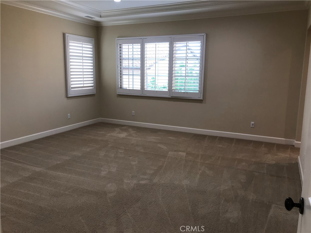 51 Domani Irvine, CA 92618 - Photo 6 of 8 a view of an empty room with a window