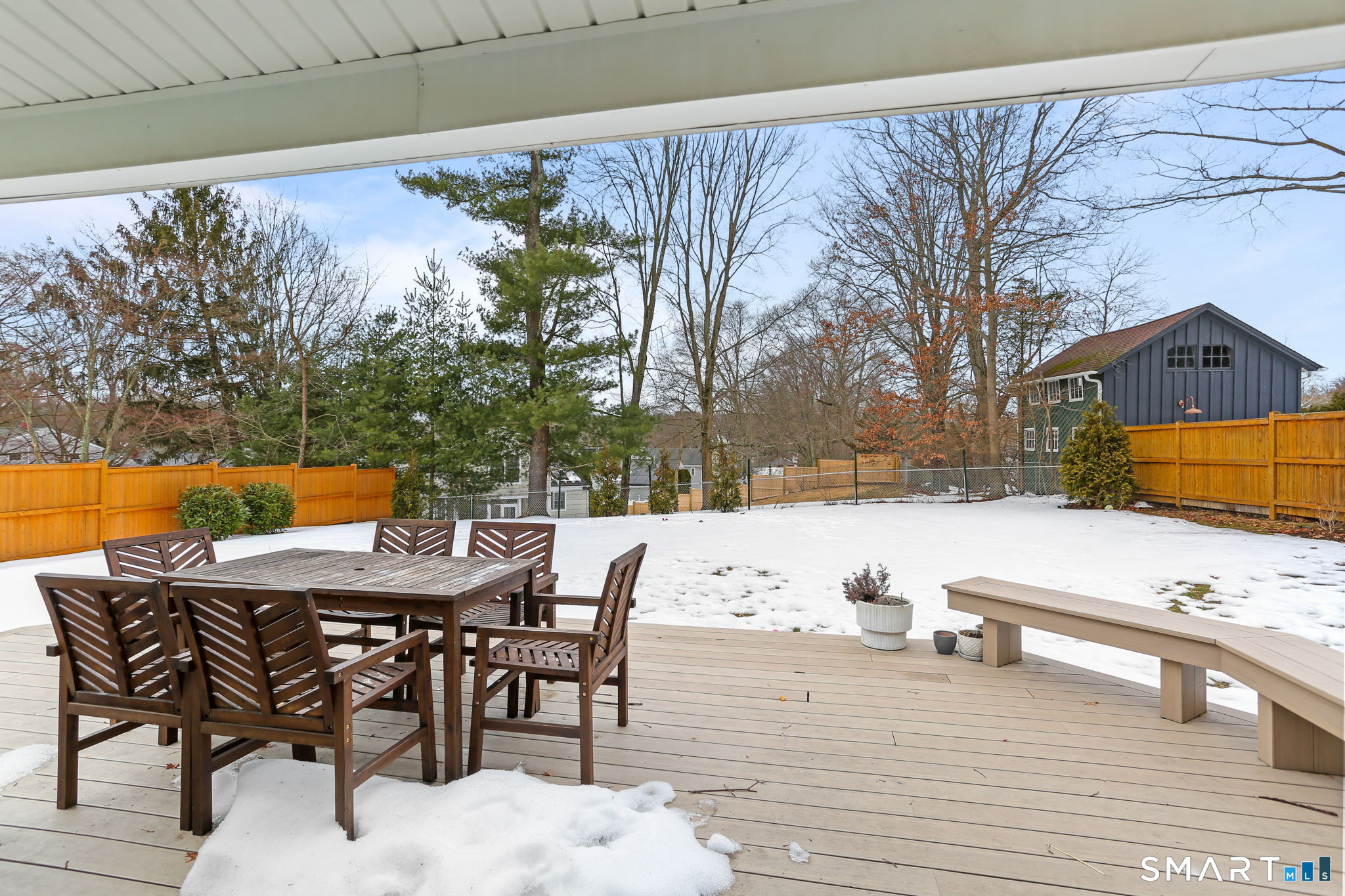 1353 Mill Plain Road Fairfield, CT 06824 - Photo 25 of 37 a view of backyard with a table and chairs