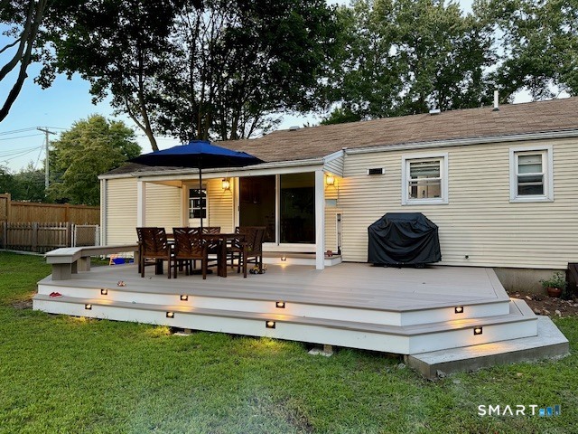1353 Mill Plain Road Fairfield, CT 06824 - Photo 36 of 37 a view of a house with backyard and sitting area