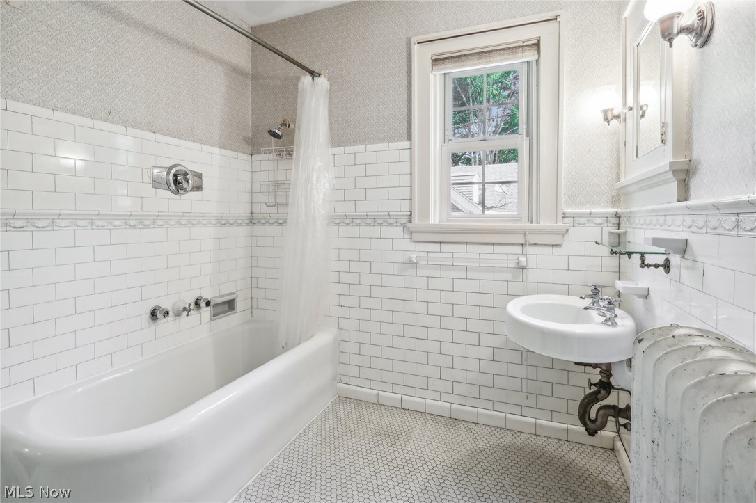 2329 Stillman Road Cleveland, OH 44118 - Photo 32 of 49 Bathroom featuring tile floors, sink, tile walls, and shower / tub combo