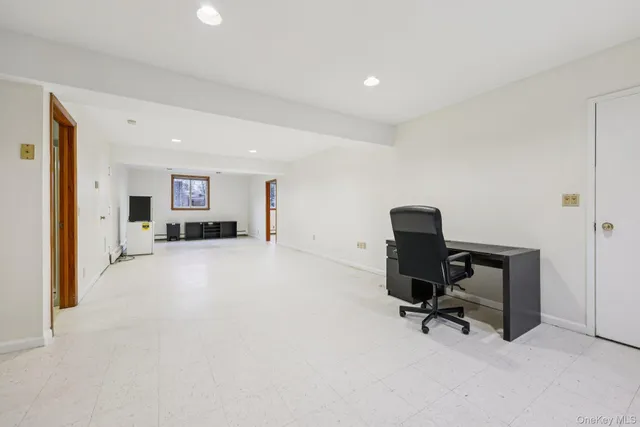 a view of workspace with livingroom