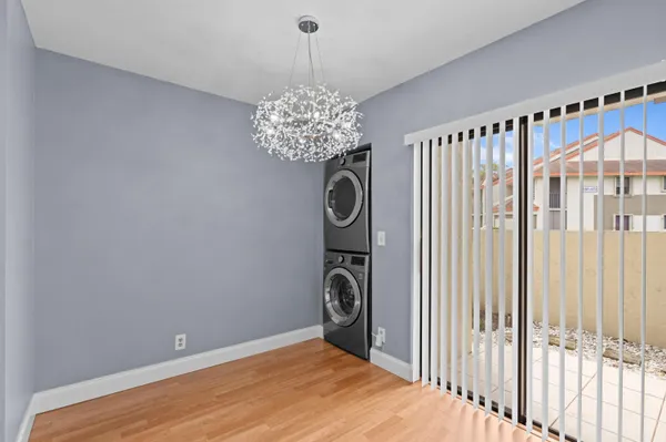 a view of a hallway with windows