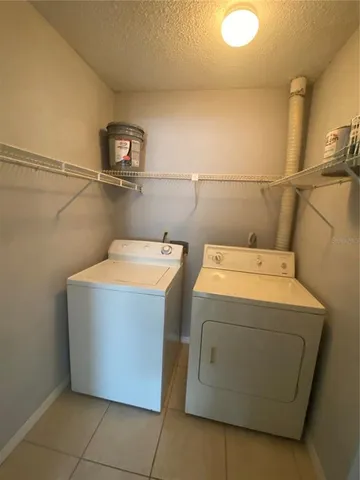 a view of a balcony with wooden floor