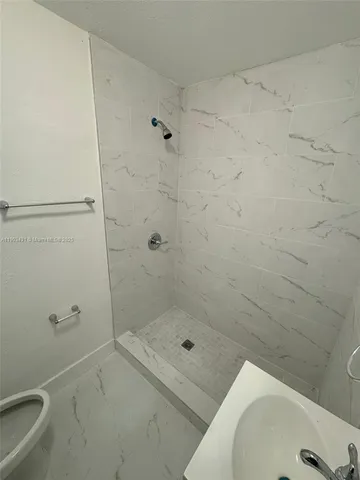 a bathroom with a sink and a toilet