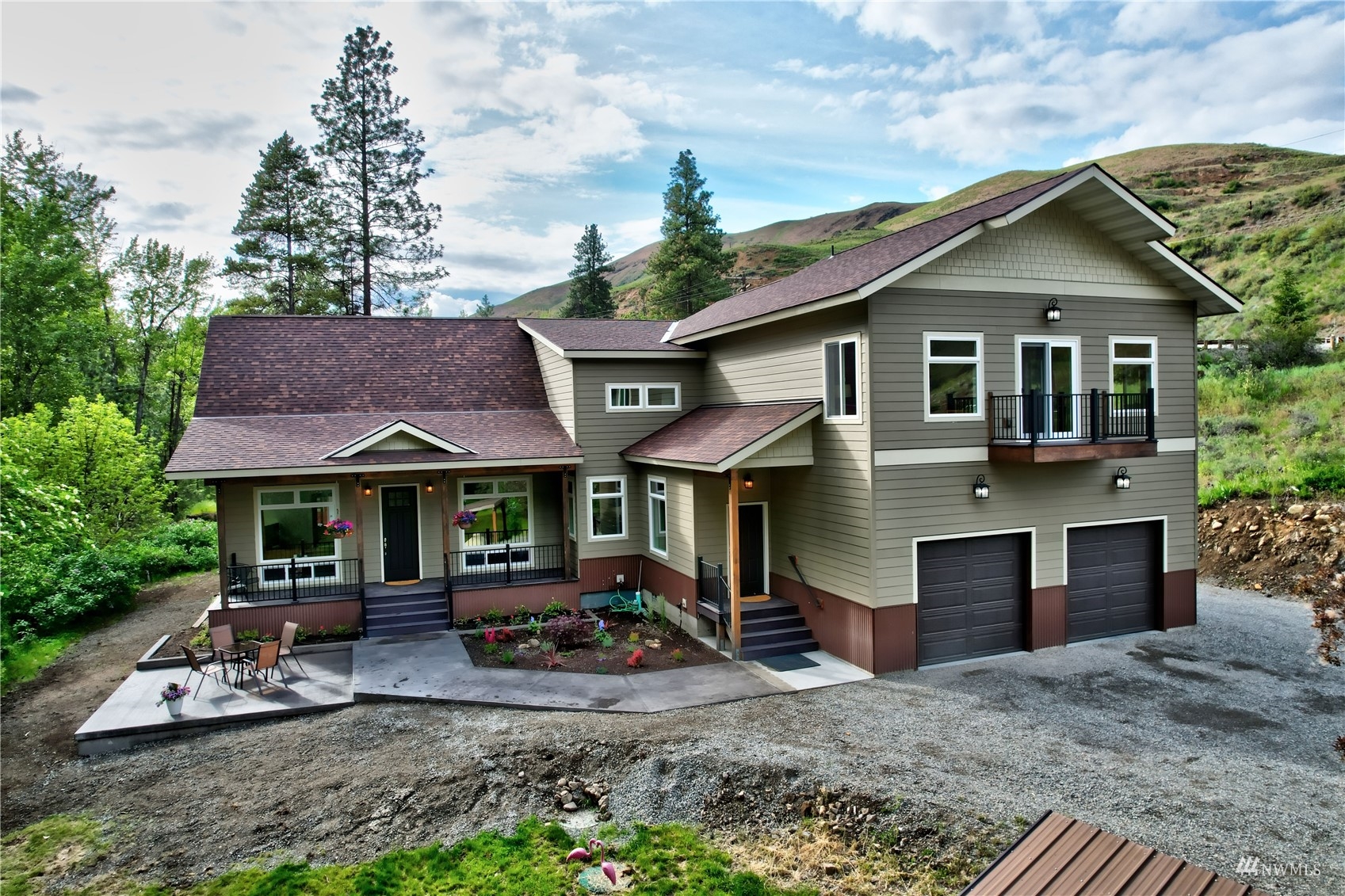 a front view of a house with garden