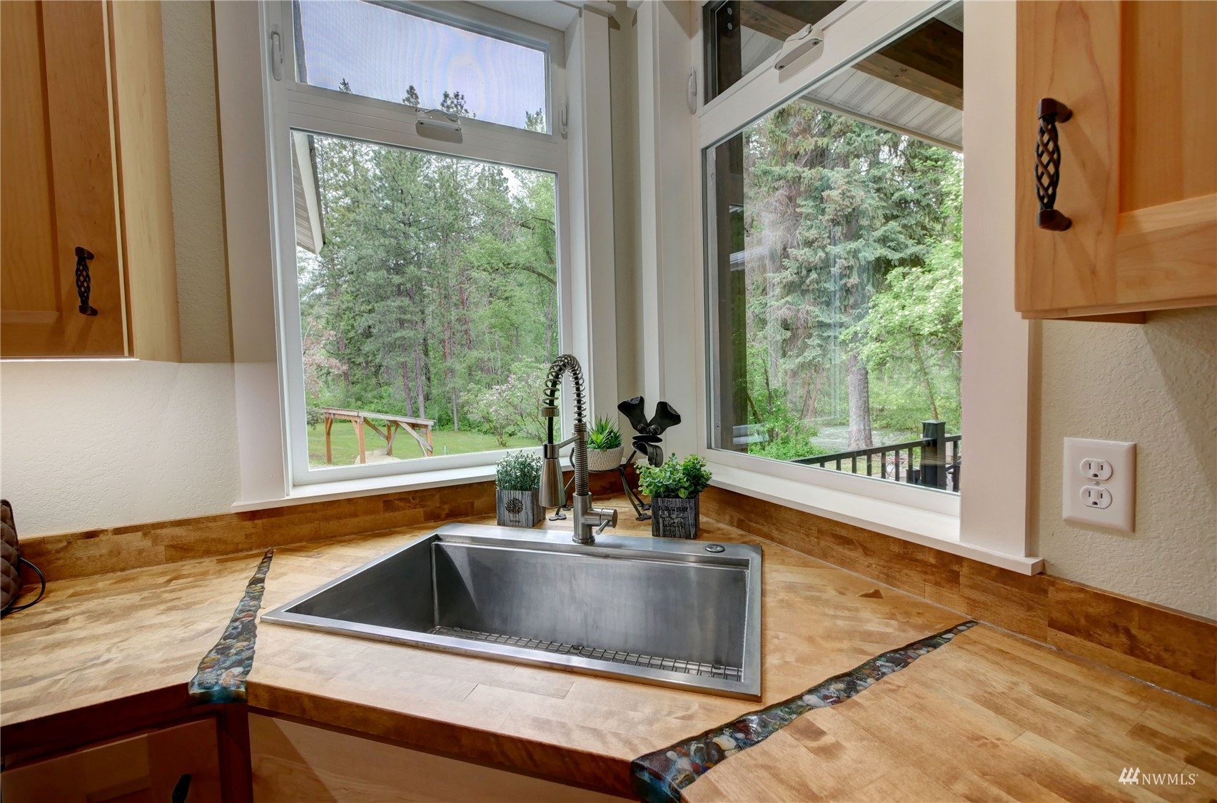 155 Twisp River Road Twisp, WA 98856 - Photo 12 of 39 a kitchen with a sink and a window