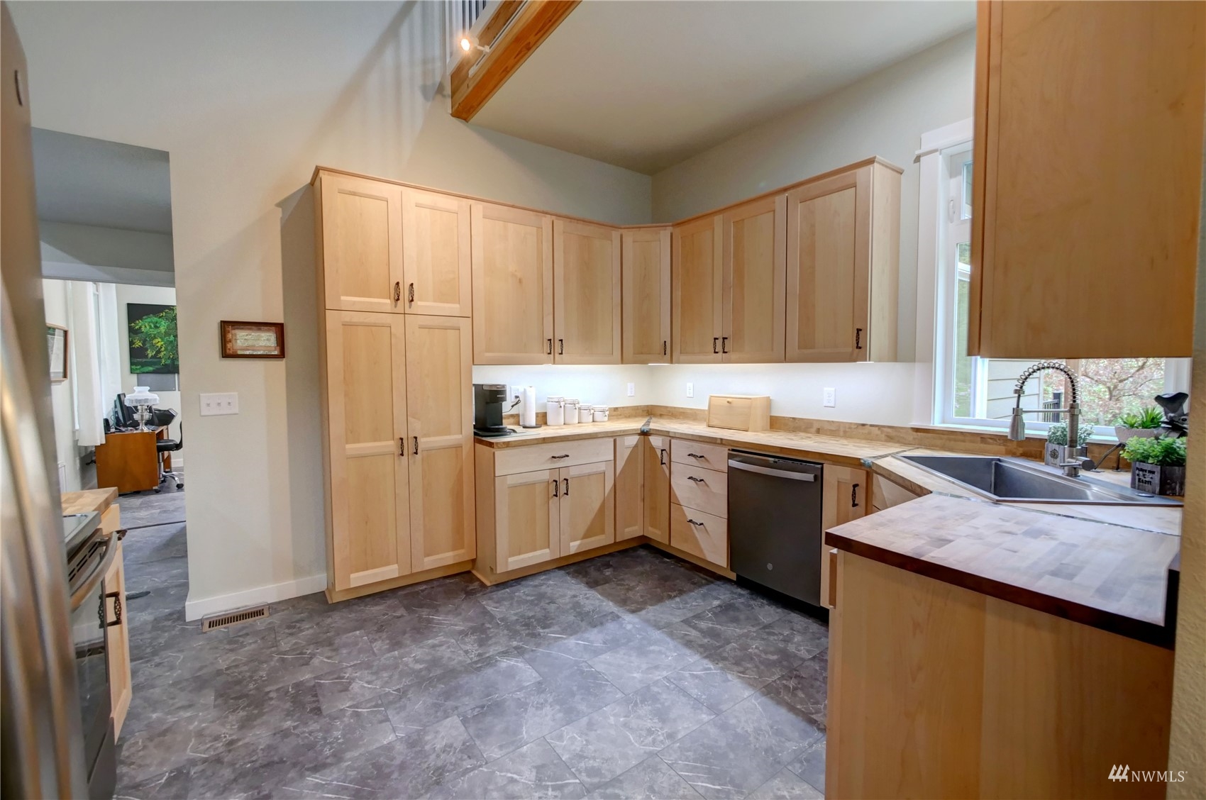 155 Twisp River Road Twisp, WA 98856 - Photo 13 of 39 a kitchen with a sink stove and refrigerator