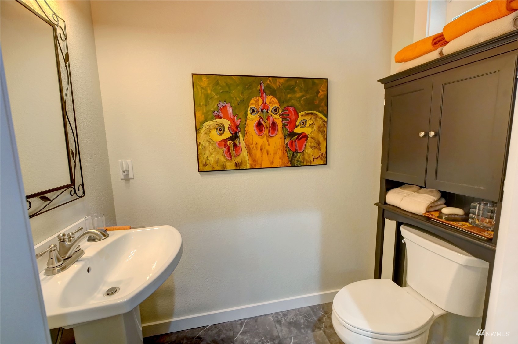 155 Twisp River Road Twisp, WA 98856 - Photo 21 of 39 a bathroom with a sink mirror vanity and toilet