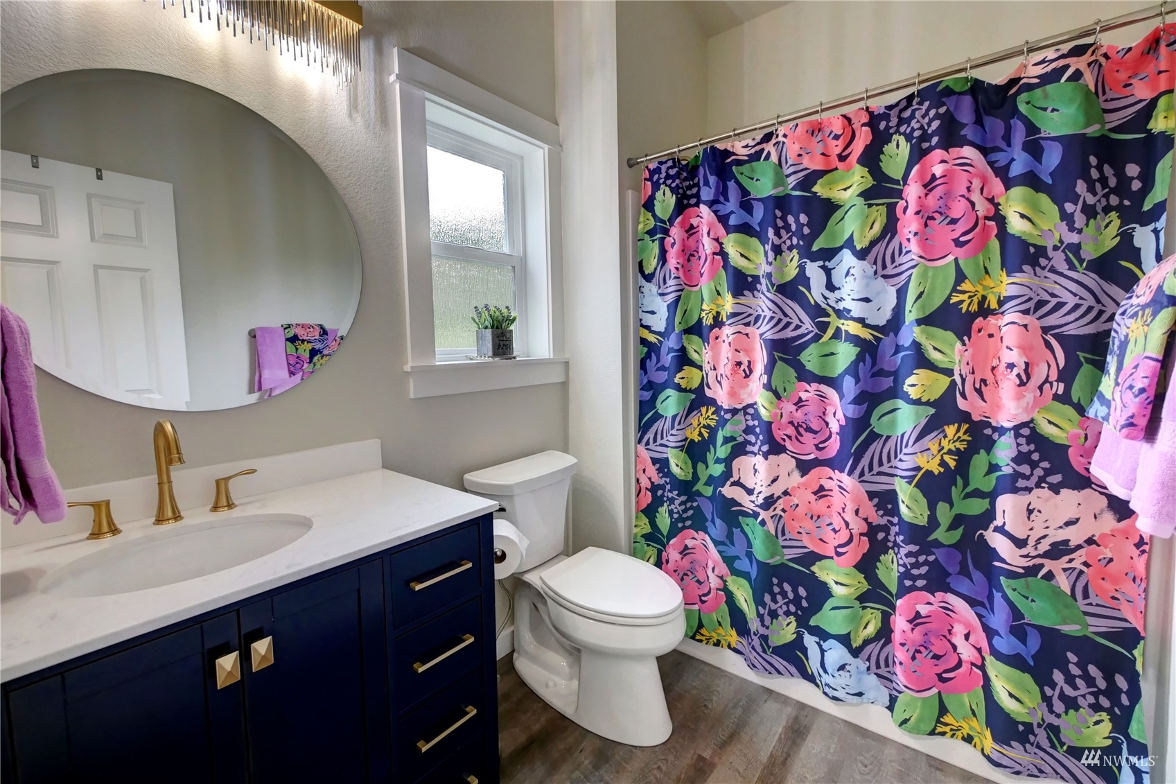 155 Twisp River Road Twisp, WA 98856 - Photo 31 of 39 a bathroom with a sink mirror vanity and toilet