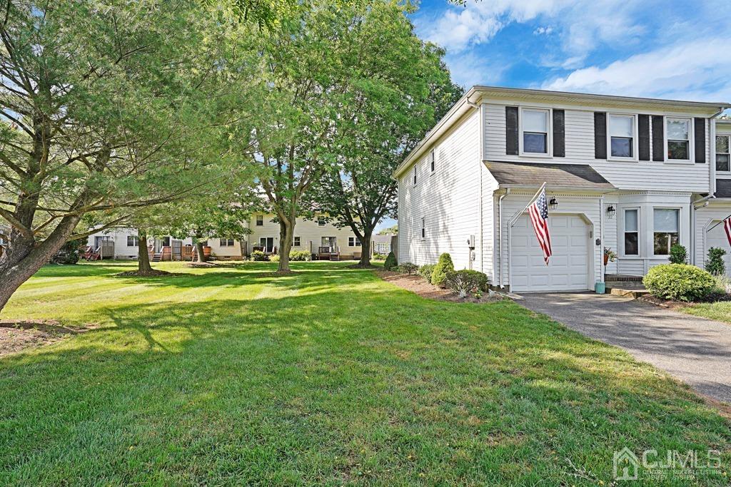 22 Hickory Court Middlesex, NJ 08846 - Photo 2 of 26 a front view of a house with a yard